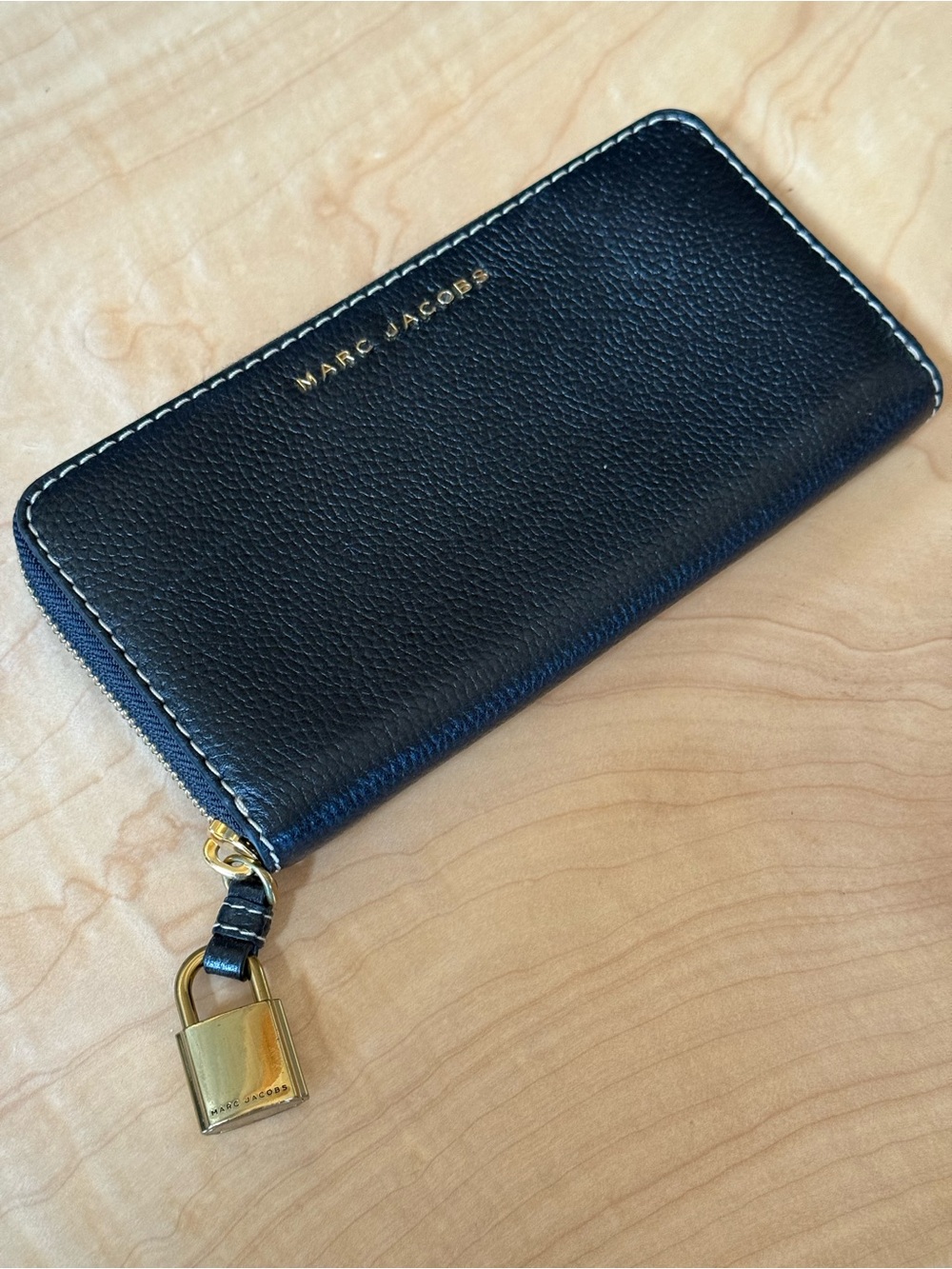 Marc Jacobs (non diffusion line)pebbled black wallet.Gold tone lock zipper pull